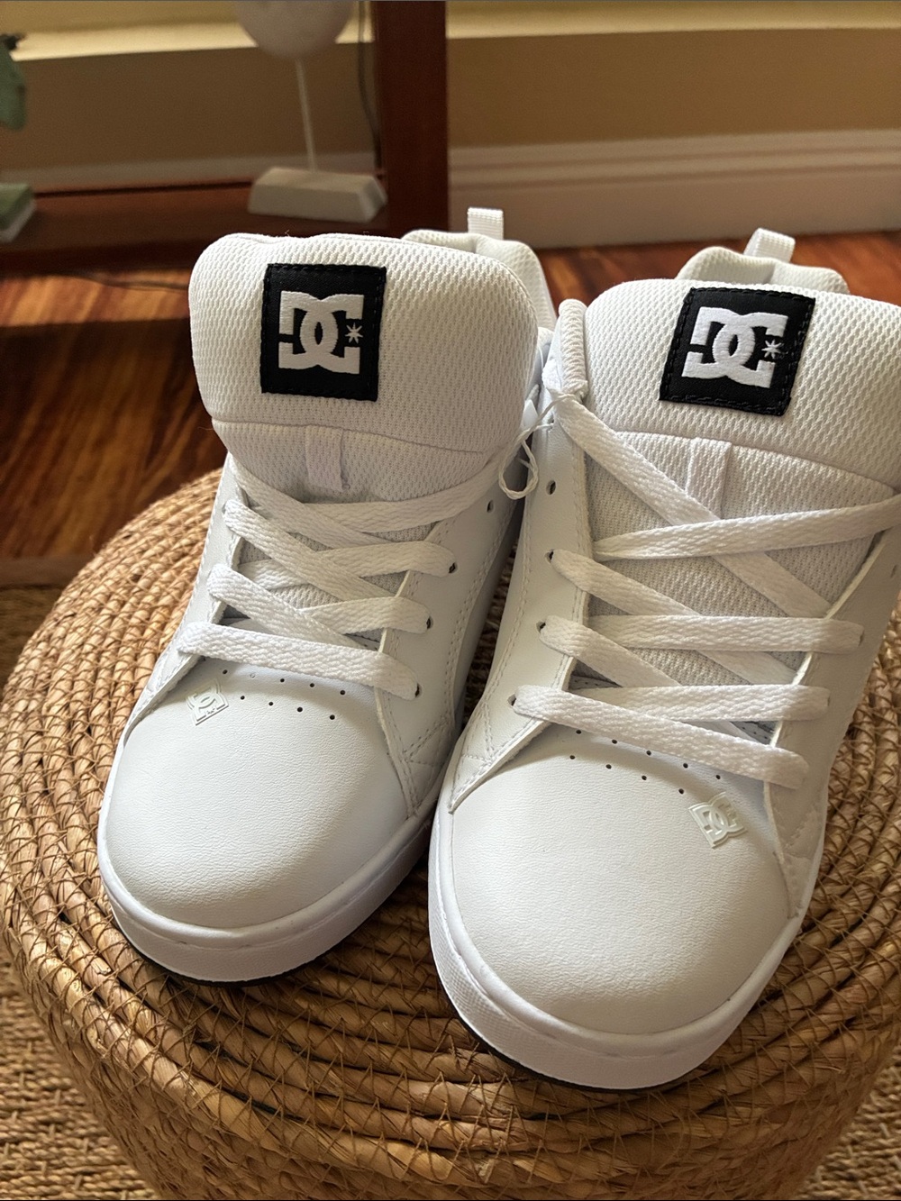 DC White High-Top Athletic Sneakers with Black Logo Patch